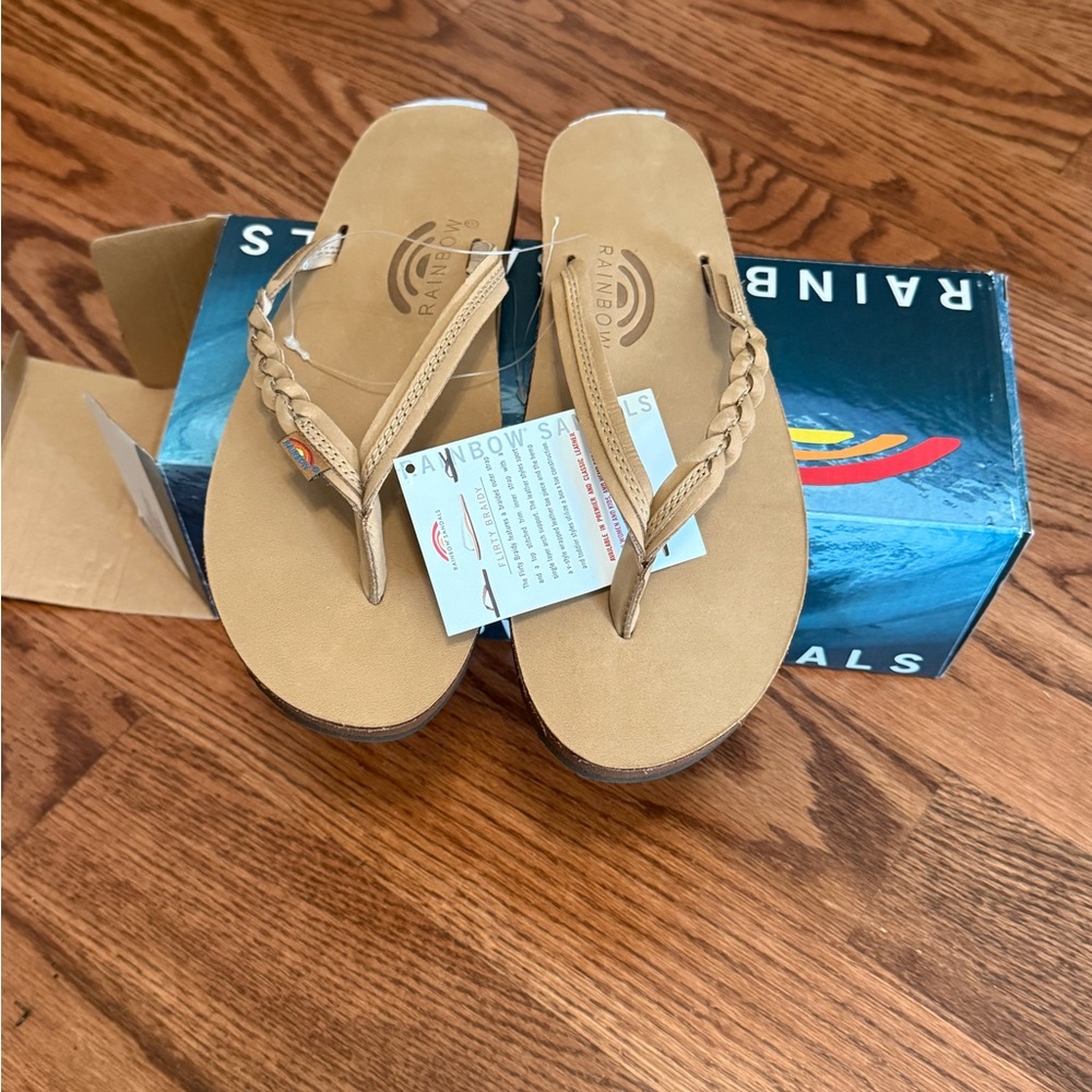 NIB Women’s Rainbow Flip Flops - Flirty Braidy Size L/10 Sierra Brown color.